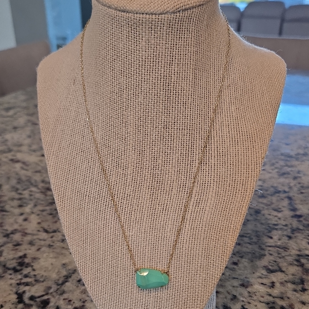 Elegant Gold Necklace with Green Pendant